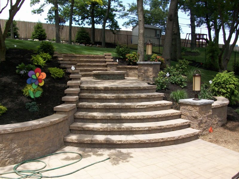 backyard fire pit patio with staircase